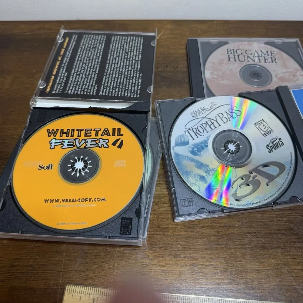 Lot 4 Vintage PC Hunting Fishing Games Upland Hunter Big Game Trophy Bass Deer